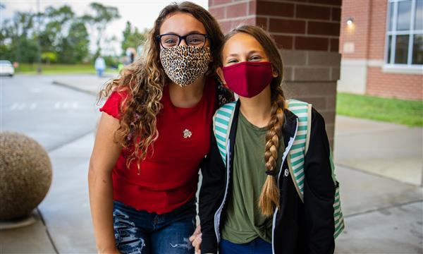 students smile on first day of school